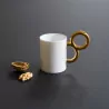 Tasse à Café et sa sous-tasse Manièriste Extranorm - Or