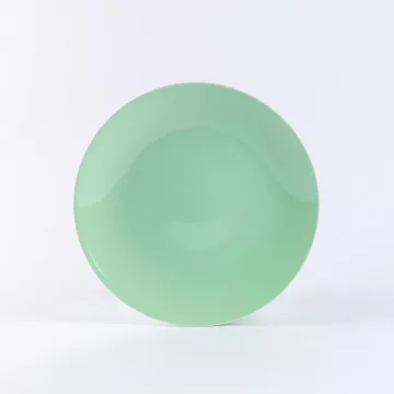 Grande assiette ronde en porcelaine verte - Ogre La Fabrique