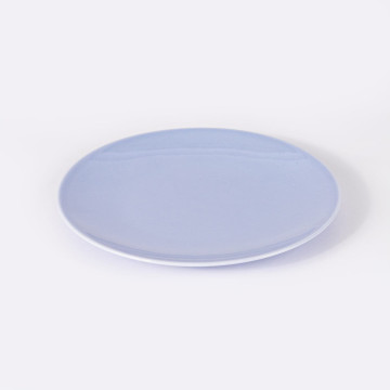 Assiette à dessert plate et ronde en porcelaine bleue - Ogre La Fabrique